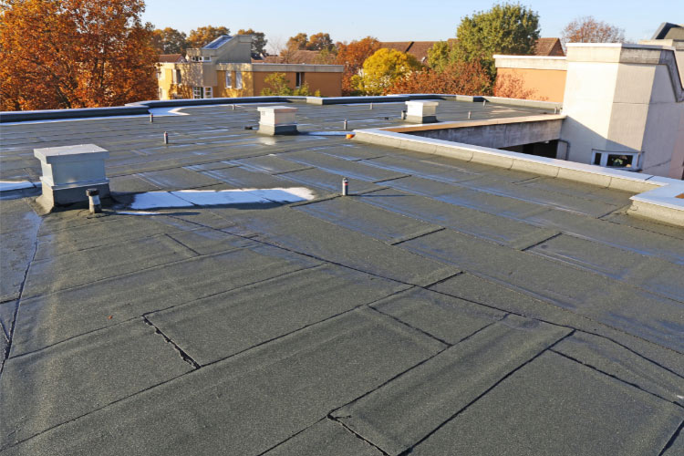 roofer laying tile roof